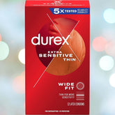 A red box of "Durex Extra Sensitive 'Wide Fit' 60mm Condoms" is displayed, showcasing features such as "Wide Fit" and "5X Tested Reliability & Durability." Inside the packaging are 12 latex condoms designed for enhanced sensitivity.